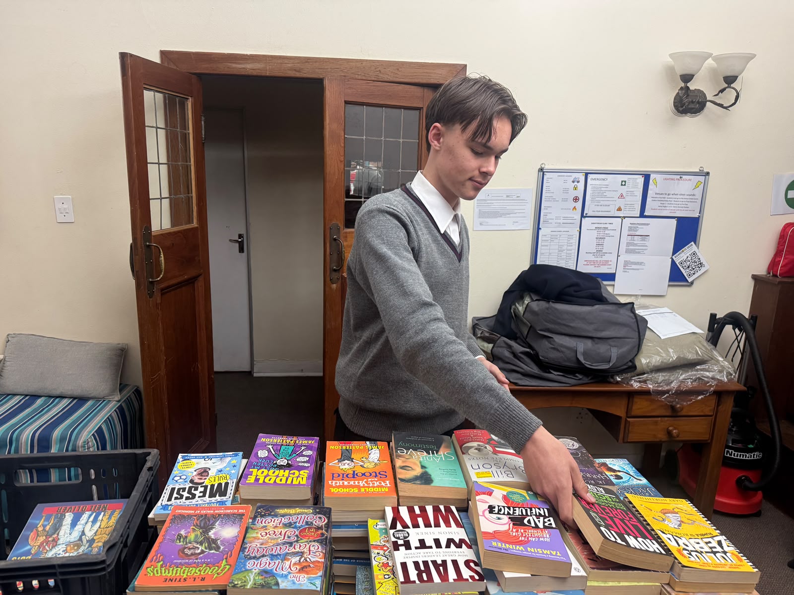 Johannesburg students sorting donated books
